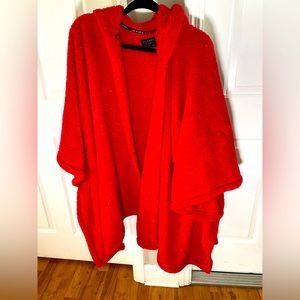 Cape/jacket with arm holes. Women’s one size.
